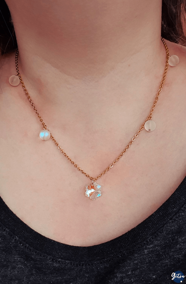 Collier en flocon de neige et perles de verre