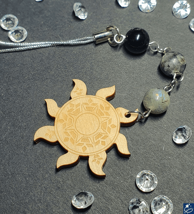 Bijou de téléphone soleil - labradorite, labradorite noire et onyx
