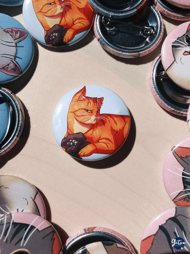 Badge chat roux