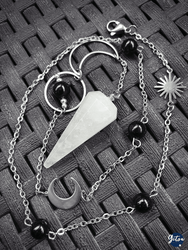 Collier pendule en cristal de roche et tourmaline noire