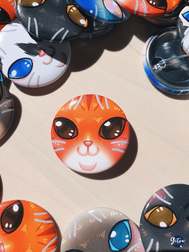 Badge chat roux