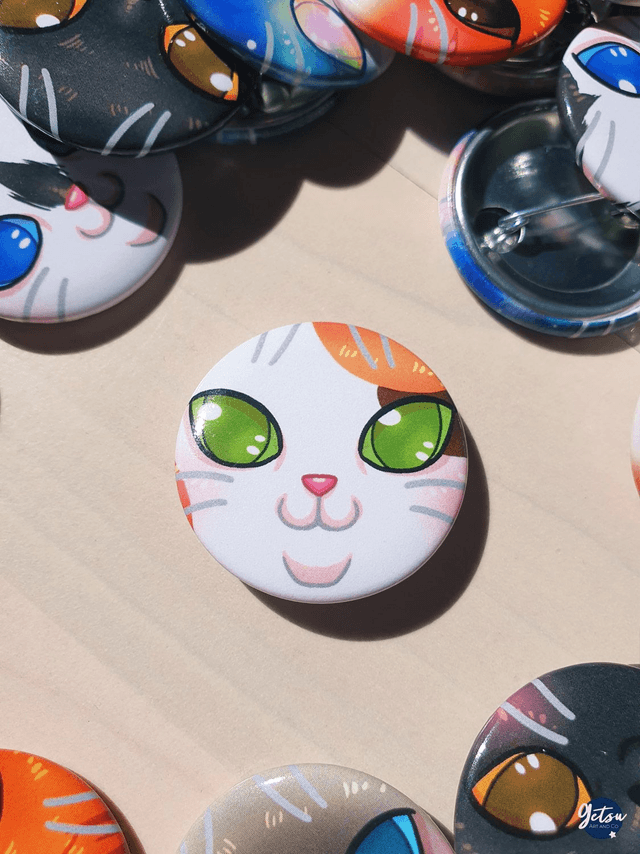 Badge chat calicot